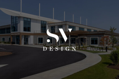 Modern office/medical building with large glass windows, curved driveway, and landscaped grounds; white logo text "SV DESIGN" centered over the facade.
